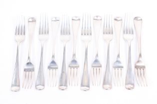Twelve George III silver old English pattern table forks.