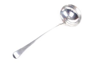 A George III silver old English pattern soup ladle.