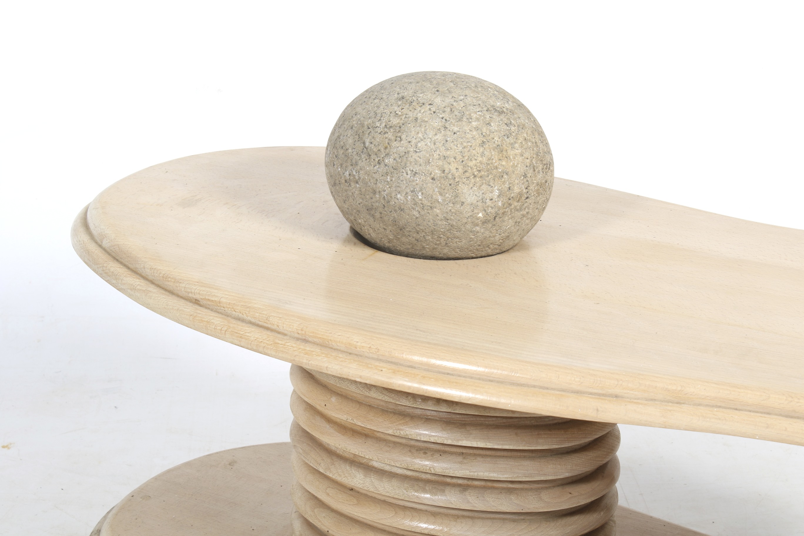 A contemporary single pedestal blonde oak coffee table with large pebble. - Image 2 of 2