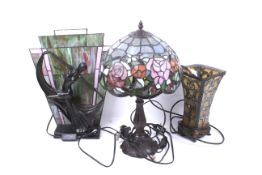 Three assorted contemporary 'art nouveau' style leaded glass table lamps. Max.