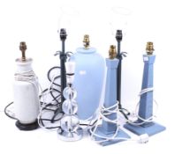 Seven contemporary lamp bases.