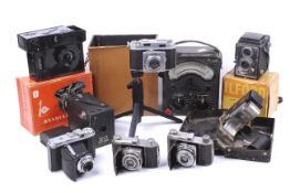 A collection of assorted vintage film cameras.
