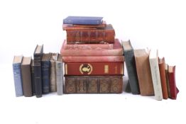 A collection of assorted books. Including a Holy Bible and illustrated Sherlock Holmes no.