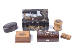 Six small vintage boxes.