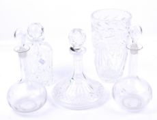 Five pieces of contemporary glassware.