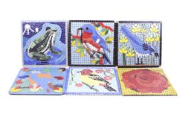 Six contemporary mosaic tiles.