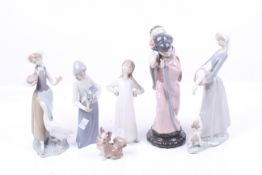 A collection of six assorted Spanish porcelain figures.