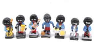 Seven Robertsons 'Golly' figures. Comprising a footballer and six musicians, H7.