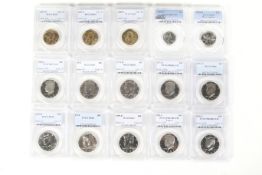 A collection of fifteen slabbed PGCS USA coins.