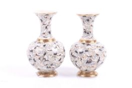 A pair of Meiji period Japanese Satsuma miniature crane vases.