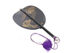 A 20th century Japanese lacquered wood gunbai fan.