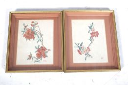 A pair of Chinese wood cut floral prints. Framed and glazed.
