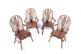 Four miniature 'apprentice piece' doll's wheel back Windsor chairs. All initialed 'F. A. P.