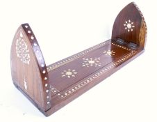 A inlaid Anglo Indian rosewood book slide. With arched folding ends. H15cm x W38cm x D13cm.