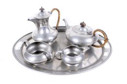 An early 20th century Travis Wilson & Co Ltd, Sheffield Pewter Manor Period tea set.