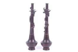 A pair of Japanese bronze vases.