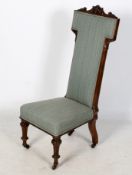 A Victorian mahogany framed prayer chair.