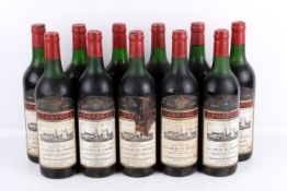 Eleven bottles of Bordeaux Reserve Saint Emilion red wine.