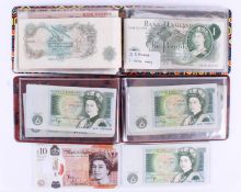 A collection of English banknotes.