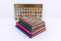A collection of worldwide stamps in five albums.