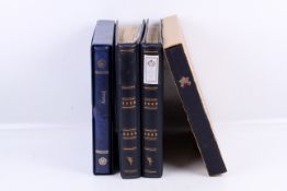 A collection of Worldwide stamps in four albums.