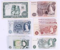 A group of English banknotes.