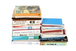 A collection of assorted clock related books.