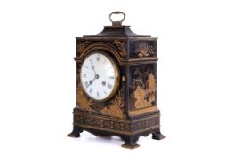 A French early 20th c Chinoiserie laquered mantle clock.