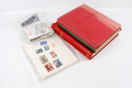 A worldwide collection of stamps and covers in three albums and loose.