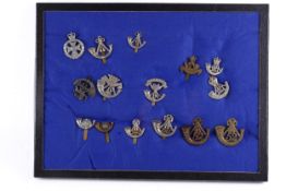 A collection of fifteen Victorian and later Light Infantry badges.
