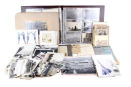 A collection of WWII photographs, a flying log book and more.