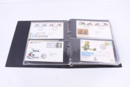 A collection of Great Britain First Day Covers in a Stanley Gibbons Album.