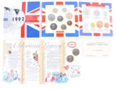 A collection of coins. Including two 1989 £2 coins plus other sets etc.