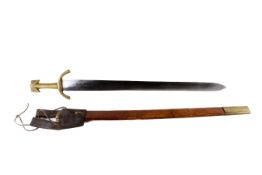A replica Viking style brass handled sword. Blade L72.8cm, in a leather and brass fitted scabbard.