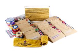 A large collection of assorted military medal ribbons, many sorted by rank.