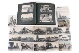 An album and several loose assorted WWI era and later postcards.