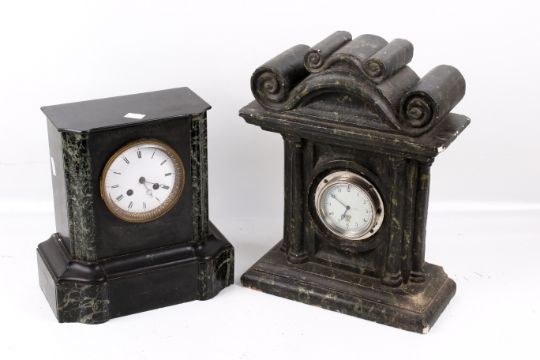 Two mantel clocks.