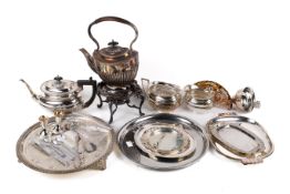 A collection of silver plated items. Including a teapot and matching sugar bowl, salver, etc. Max.