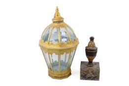 A solid cast metal finial and a painted lantern. Finial mounted on a metal plinth. Max.
