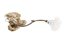 A converted brass wall light fitting.