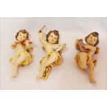 3 Holzfiguren 'Musizierende Engel', farbig gefaßt, H ca. 24 cm, teils berieben
