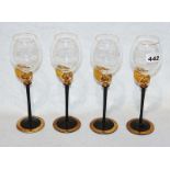 4 Weingläser mit schwarzem Stiel und goldfarbener Schnecke, H 26 cm, signiert Eder ?,