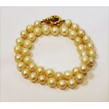 Perlenkette mit 14 k Gelbgold Schließe, L 40 cm, Perlen teils matt, Tragespuren