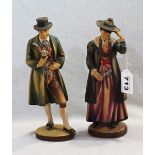 2 Holzfiguren 'Trachtenpaar', farbig gefaßt, H 25/26 cm