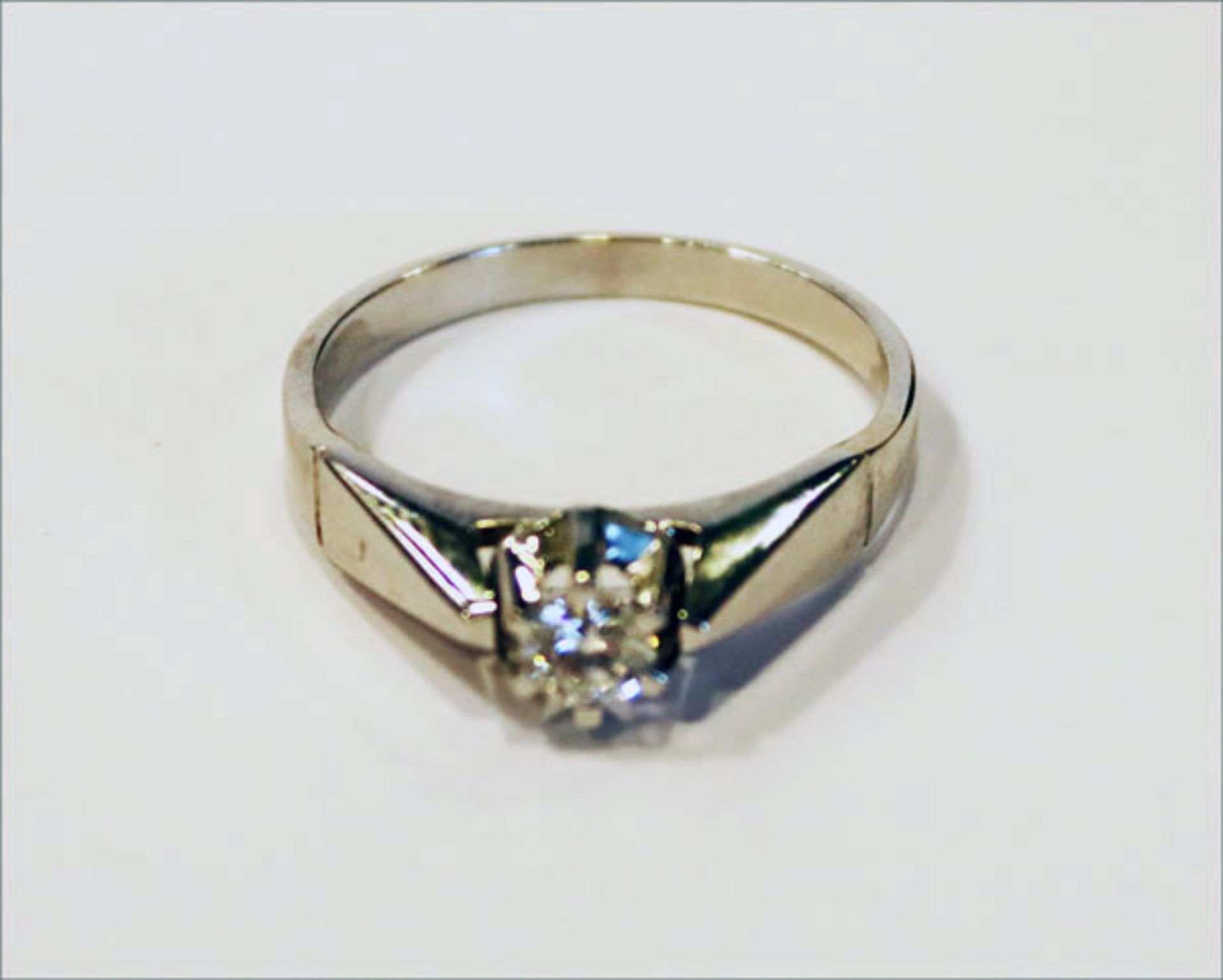 18 k Weißgold Ring mit Diamant, ca. 0,25 ct., 4,6 gr., Gr. 58