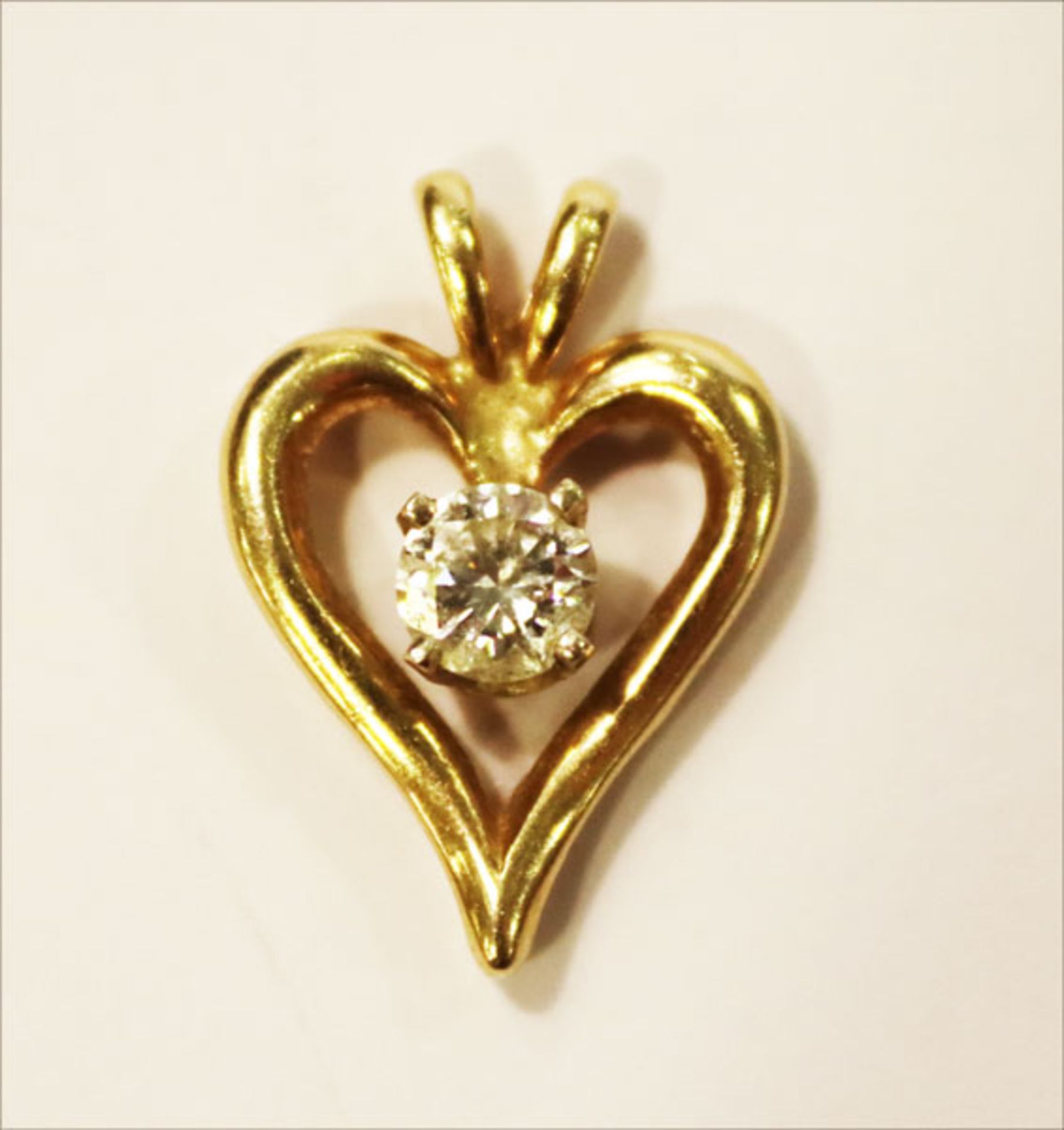 14 k Gelbgold Herz-Anhänger mit Diamant, ca. 0,25 ct., 1,5 cm x 1 cm