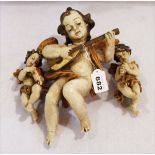 Konvolut von 3 Holzfiguren 'Musizierende Engel', gefaßt, H 18/35 cm, teils berieben und bestossen