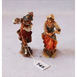 2 Holzfiguren 'Musizierendes Paar', farbig gefaßt, H 14,5 cm