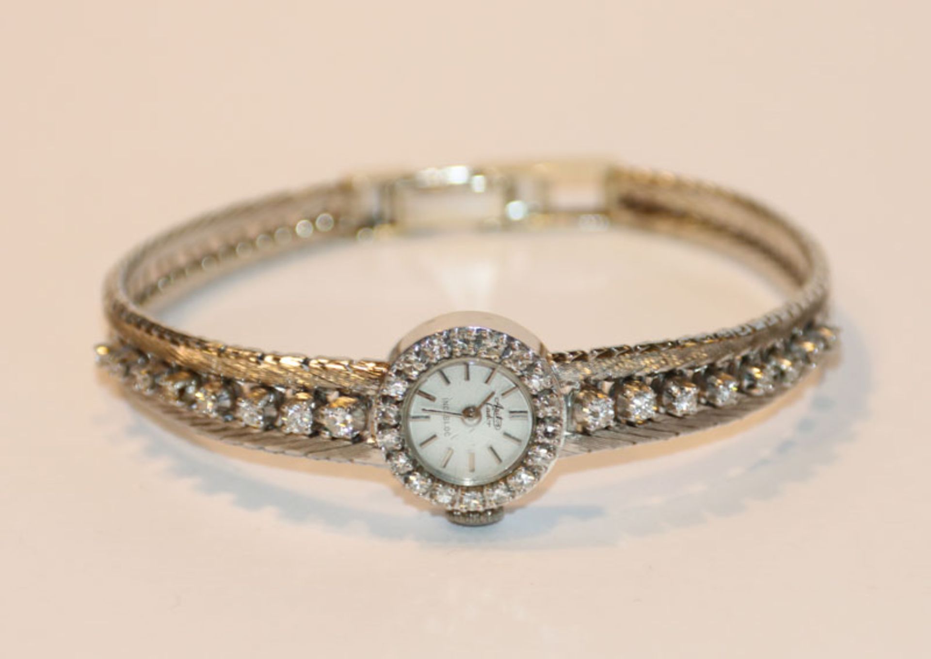 18 k Weißgold Damen Armbanduhr, Arctos Cador Incabloc, mit 34 Diamanten, 24,3 gr., L 16 cm, Funktion