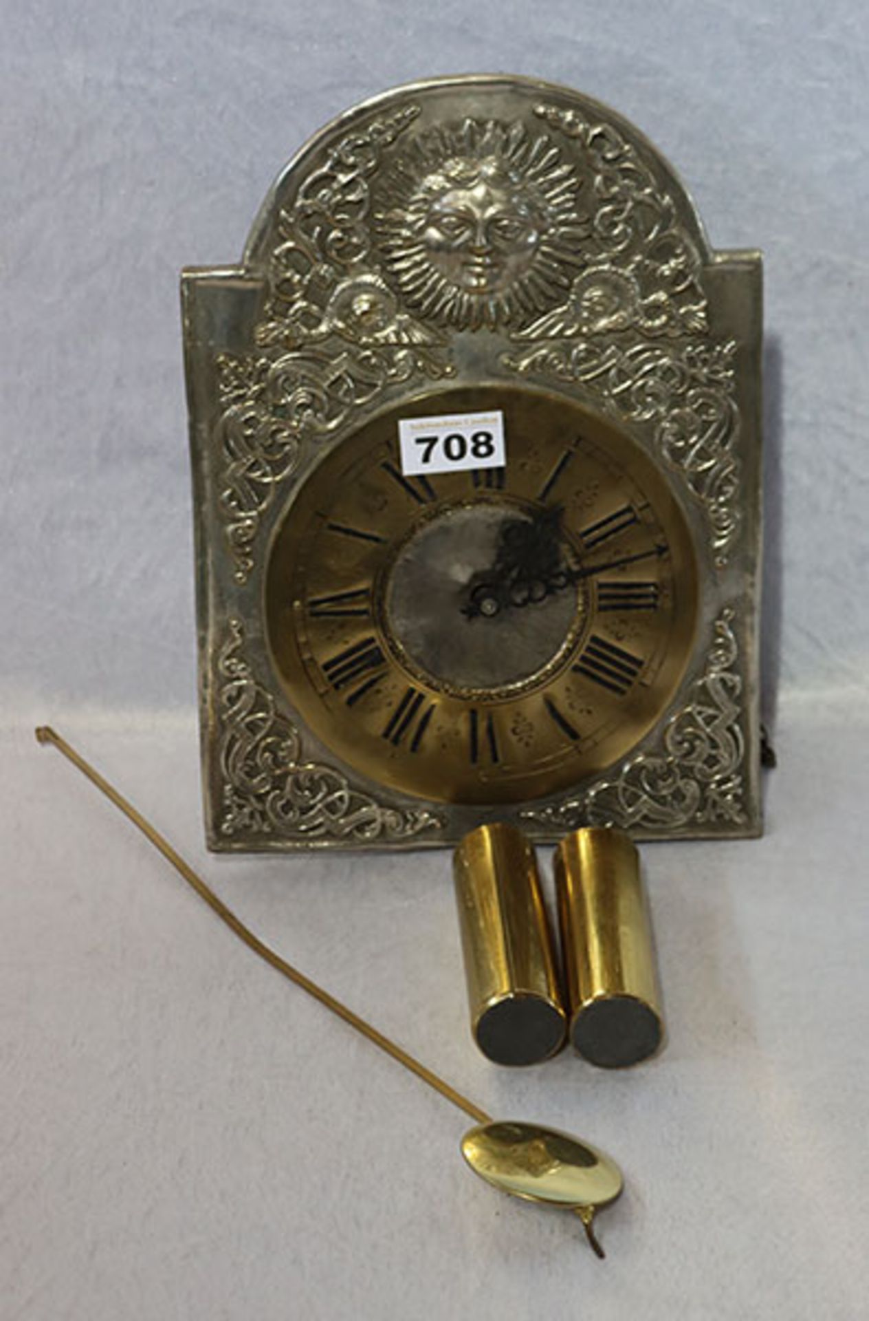 Metall Wanduhr mit Reliefdekor, mit Pendel und 2 Gewichten, H 30 cm, B 20 cm, Funktion nicht